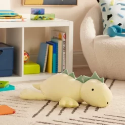 Dinosaur Weighted Plush Kids' Throw Pillow Yellow - Pillowfort™